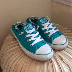 teal converse with stretch back